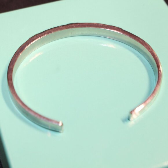 Silver-Tone Cuff Bracelet with Crystal Accents & Pyramid Stud Design - Picture 4 of 5